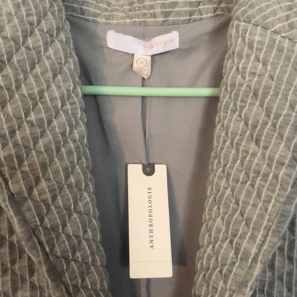 Grey stripped coat.
